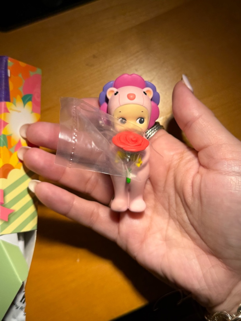 Mini Pink Lion Costume Figurine with Red Rose